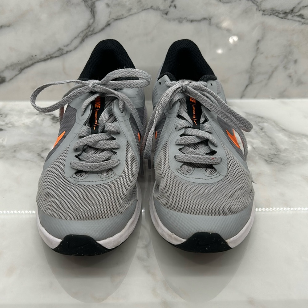 Nike boys running shoe.